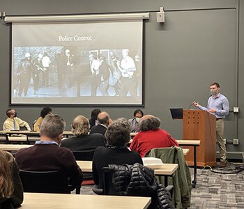 Connor presents his research